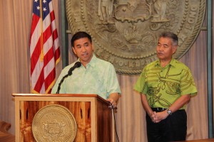 CIO Todd Nacapuy and Governor David Ige speaking at a news conference